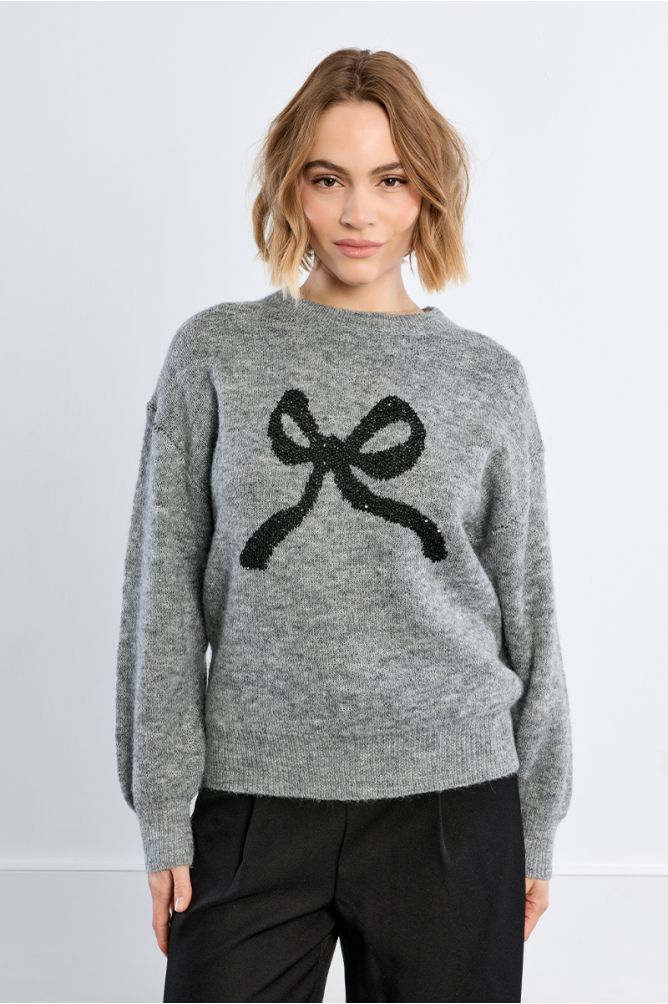 Knitted sweater, bow pattern
