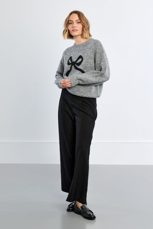 Knitted sweater, bow pattern