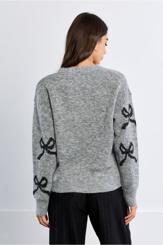 Knitted cardigan, bow patterns