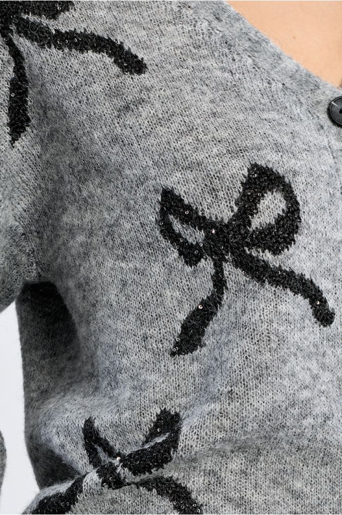 Knitted cardigan, bow patterns