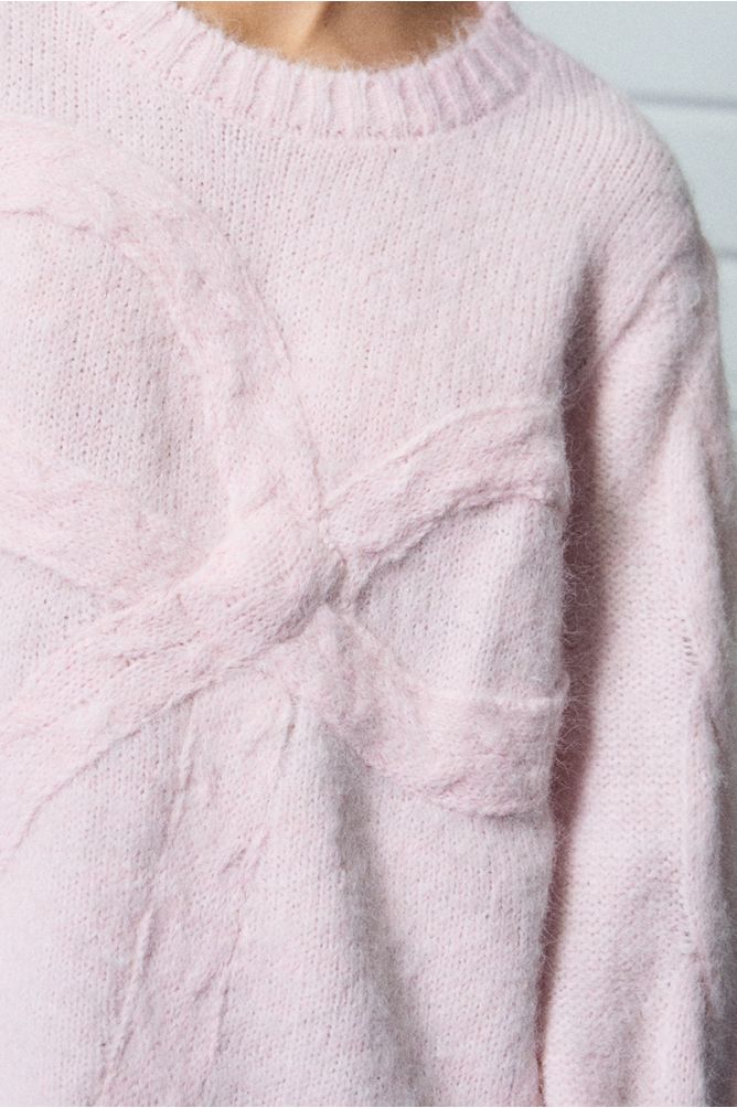Knitted sweater with bow detail