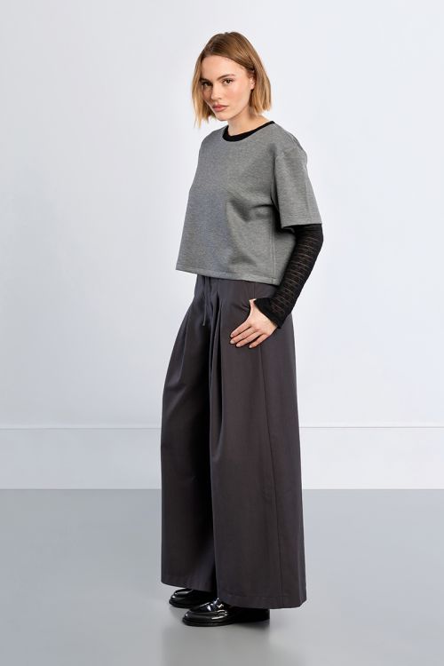 Baggy trousers, pleated