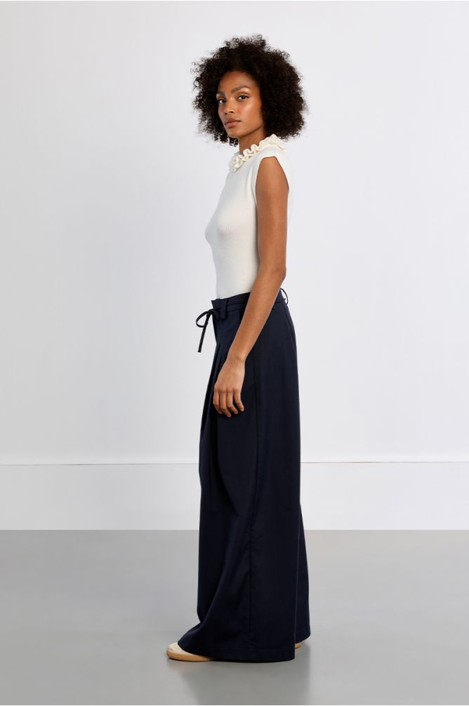 Baggy trousers, pleated