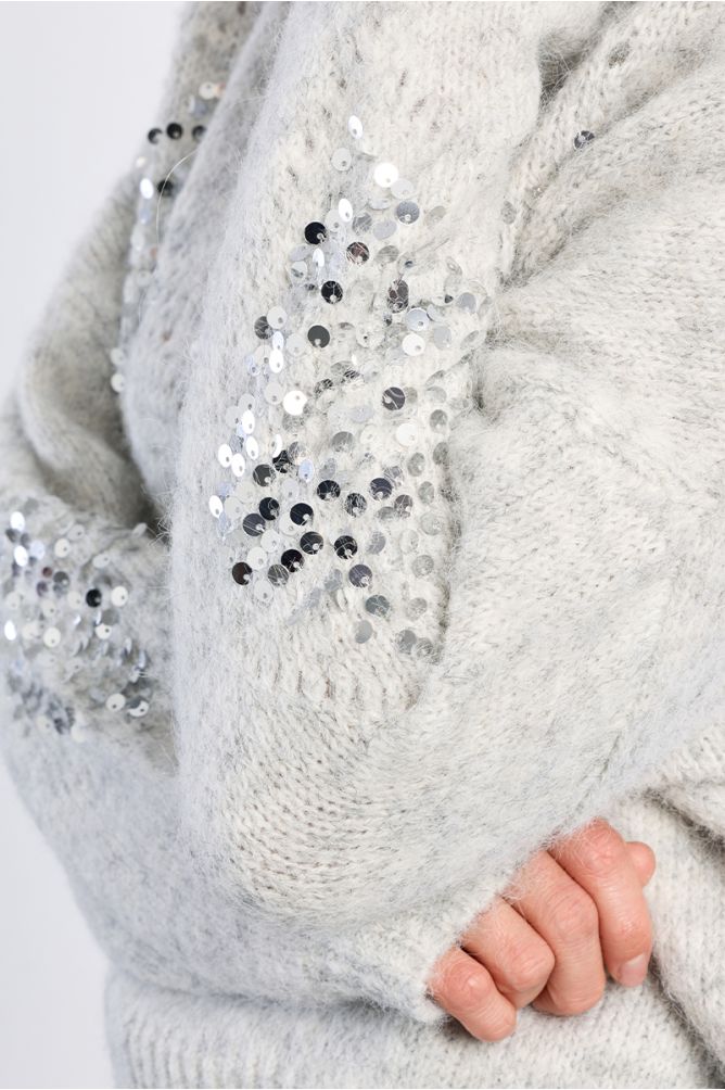 Pull à carreaux et strass