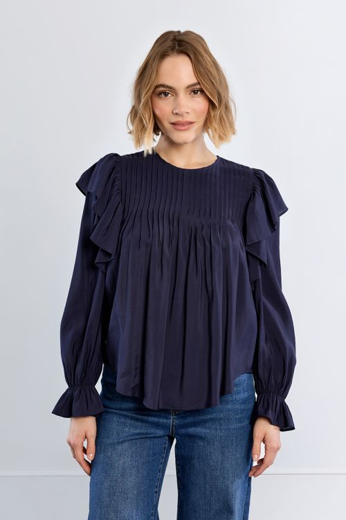 Blusa de manga larga con volantes