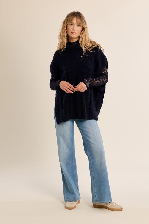 Poncho en maille torsadée