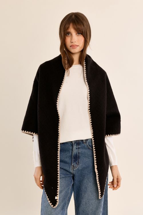 Poncho largo con detalles bordados